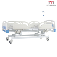Lit médical manuel 3 fonctions économique MT avec têtes et pieds de lit en ABS et 4 barrières de sécurité