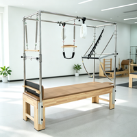 Table de Pilates Cadillac en bois de caoutchouc commercial avec coussin en PU pour la rééducation en studio