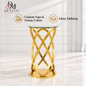 Mesa de Cóctel de Acero Inoxidable Dorado con Cinta Entrelazada para Proyectos Hoteleros y Bares, con Cubierta de Vidrio Templado - Product Image 1