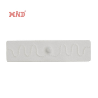 Étiquette RFID UHF lavable 860-960 MHz longue portée pour le suivi des textiles, du linge et des vêtements