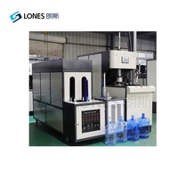 Machine de soufflage de bouteilles d'eau en plastique PET semi-automatique de haute qualité 5L-25L avec contrôle PLC pour cycle de tambour de baril 120BPH