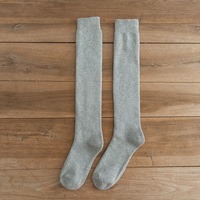 Vente en gros de chaussettes pour hommes Chaussettes longues tube épaisses pour l'hiver à mollet Chaussettes hautes chaudes et moelleuses pour hommes Bas à boucle