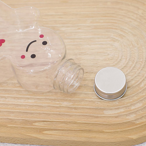 Venta al por mayor 16OZ 500ml PET Gingerbread Man Milk Tea Juice Botella de plástico para la decoración navideña - Product Image 5