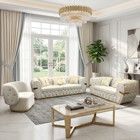 Ensemble de canapés sectionnels incurvés Chesterfield de luxe moderne haut de gamme en tissu velours durable, garni d'éponge, avec structure en acier inoxydable pour villa