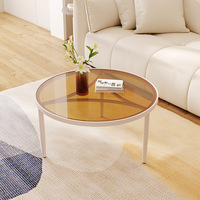 Table basse de style nordique avec structure métallique et plateau en verre trempé pour petit appartement, balcon, salon