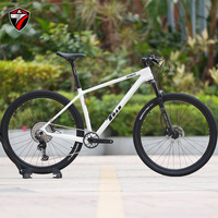 Vélo de montagne en fibre de carbone 29 pouces 12 vitesses Frein à disque hydraulique Fourche rigide VTT XC Axe traversant Boost VTT confortable