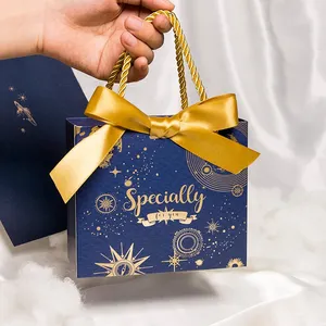 Bolsa de papel embalaje reutilizable para ropa personalizada, bolsa de regalo con estampado de lujo, embalaje de compras, bolsas de papel