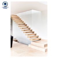 Optima Escalier droit flottant avec supports en porte-à-faux cachés et balustrades en verre pour maisons contemporaines Escaliers