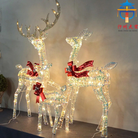 Lanterne géante LED en forme de traîneau et de rennes pour la place publique, décoration artistique en soie pour les célébrations de Noël en extérieur, ensemble paysager