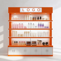 Présentoir cosmétique rose à cadre noir, 4 niveaux, avec écran d'affichage supérieur et portes roses