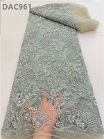 Vente en gros de tissu textile en polyester à sequins en maille, dentelle perlée, dentelle élastique de luxe, broderie de perles cordées