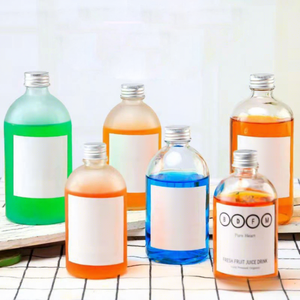 Bouteilles en verre sodocalcique de qualité alimentaire pour thé au lait, café infusé à froid, pots hermétiques pour jus de fruits, <span class=keywords><strong>vin</strong></span>, Baijiu et <span class=keywords><strong>saumure</strong></span> – Vente en gros - Product Image 1