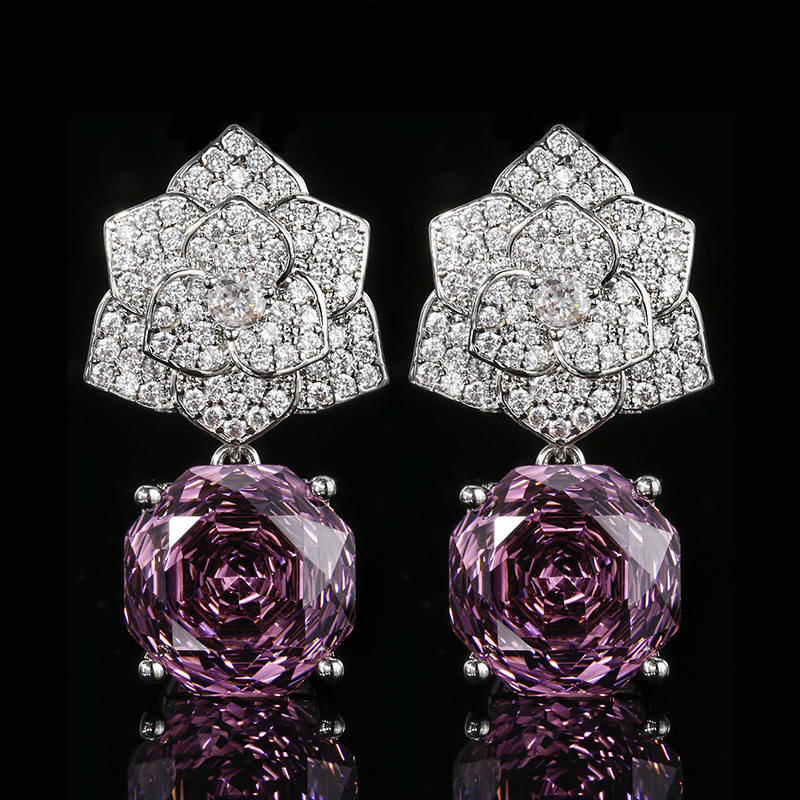 Boucles d'oreilles roses séchées