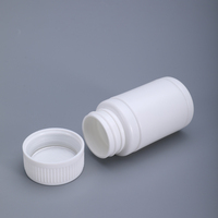 Flacon rond en HDPE blanc personnalisé de 50 ml, 100 ml, 200 ml avec bouchon à vis en plastique, emballage de capsule anti-corrosion, sérigraphie