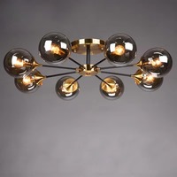Lustre LED moderne nordique du milieu du siècle, en fer doré et verre noir, pour îlot de cuisine et salon