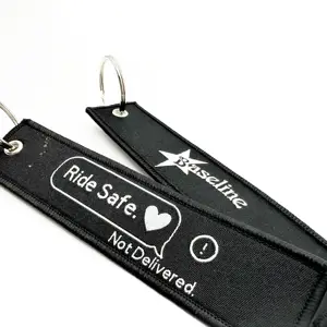 Factory Wholesale Remove Tag Embroidered Keychain Tag Belt Keychain Flight Text Pattern Embroidery Logo Jet