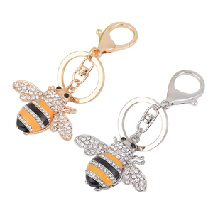 Lindo colgante de abeja esmaltada con alas e incrustaciones de diamantes de imitación, diseño de cuerpo con rayas negras, amarillas o arcoíris, y anillo de llavero resistente. - Product Image 1