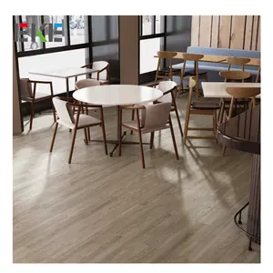 Suelo trasero seco Lvt Azulejo de vinilo de lujo Tablón geométrico 2Mm Suelo de madera Pvc Lvt Uso comercial impermeable