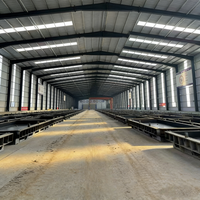 Entrepôt préfabriqué en structure métallique, atelier modulaire à grande portée, production industrielle lourde, résistant aux tremblements de terre et au feu