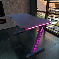 Bureau de jeu RVB moderne personnalisable Lumières LED Table d'ordinateur PC en forme de Z Design professionnel pour salle de jeu Fonction extensible