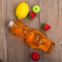 Vente chaude 350ml Bouteille de jus en plastique pour animaux de compagnie en forme d'ours avec bouchon couronne personnalisable pour l'utilisation de boissons au thé et au café