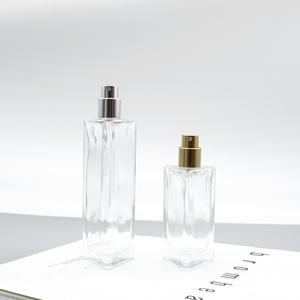 Venta al por Mayor de Botellas de Perfume de Vidrio Blanco Cristal de 50 ml, Botellas de Repuesto Cosméticas Triangulares de 30 ml con Pulverizador y Tapas a Presión - Product Image 1