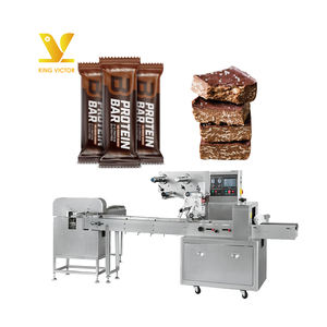 Machine à emballer multifonctionnelle de type oreiller machine à emballer les barres protéinées énergie chocolat - Product Image 1