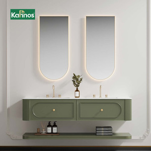 Ensemble de meubles-lavabos de salle de bain modernes de luxe en céramique vert sauge avec miroir LED arqué à cadre doré et double vasque murale - Product Image 1
