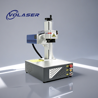 Machine de marquage et de gravure laser CO2 à tube métallique RF 40W 60W 80W à faible coût et haute performance pour code QR et numéro de série