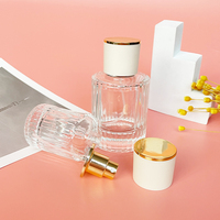 Nuevo Estilo Botella de Perfume de Vidrio de Lujo de 30ml con Forma de Cilindro y Frasco de Vidrio Transparente con Atomizador de 50ml