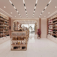 Comptoir de réception moderne rose pour salon de beauté avec mur d'accentuation circulaire LED, niches d'exposition personnalisées pour boutique, design complet