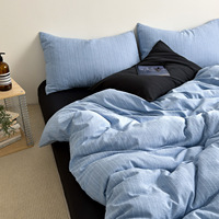 Vente en gros d'usine en stock, ensemble de literie 4 pièces rayé toutes saisons lavable, housse de couette imprimée unie très douce, OEM ODM