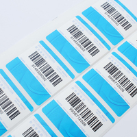 Étiquette de code à barres PET étanche de haute qualité avec logo personnalisé étiquette en rouleau d'impression autocollant d'étiquette en papier auto-adhésif