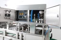 Machine automatique de remplissage et de scellage de gobelets pour yaourt, jus, lait, thé
