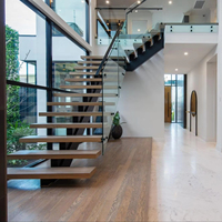 Escalier en colimaçon moderne de style minimaliste 2026 avec marches en bois massif pour projets résidentiels et villas