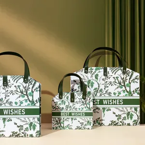 Prodotti di tendenza 2024 nuovi arrivi confezione regalo a forma di libro Mini valigia di lusso elegante confezione regalo con manico