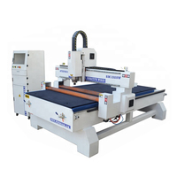 Rouleaux à pousser avec vérins pneumatiques pour routeur CNC avec commande Syntec, moteur et pompe pour table à vide et découpe de panneaux