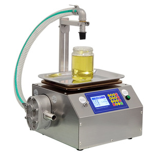 Machine de remplissage automatique électrique de haute précision pour liquides, idéale pour les petites bouteilles d'eau, garantie 1 an, utilisation facile, commande en ligne - Product Image 1