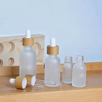 Flacon compte-gouttes en verre transparent de 30 ml/1 oz avec bouchon en bois, impression sérigraphiée, diffuseur à roseaux, logo personnalisé pour huiles essentielles et gouttes pour les yeux