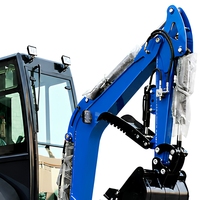 Mini-excavatrice compacte bleue sur chenilles avec cabine fermée, flèche hydraulique et godet de terrassement pour la construction et l'aménagement paysager
