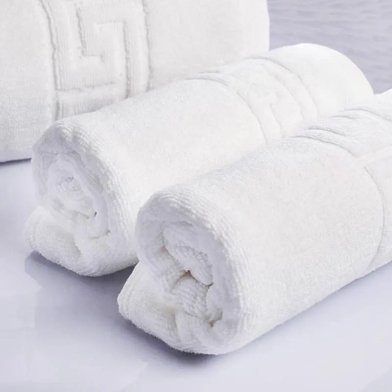 Factory supply Luxurious 70*140cm White Jacquard Spa Towel extra large Plain Cotton Bath Towel Sets For Five Star Hotel