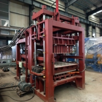 Machine à briques hydraulique entièrement automatique QT4-15 pour la fabrication de blocs creux et de pavés autobloquants, idéale pour les briqueteries