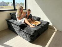 Sofá Seccional Convertible Moderno de Cuero PU, Comprimido y Sellado al Vacío, con Soporte Lumbar Ajustable y Esquinas Redondeadas para Sala de Estar