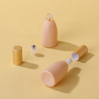 Bouteille à rouleau en verre rose de 12ML avec couvercle en or de qualité supérieure pour divers produits Design pratique et beau