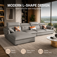 Canapé d'angle gris aspect cuir avec chaise longue, dossier capitonné et appuie-tête rembourrés pour salon, hôtel, appartement