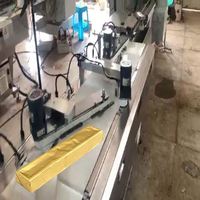 Machine d'emballage automatique de barres chocolatées en feuille d'aluminium avec distribution de colle, fonctionnement rapide, conception personnalisée