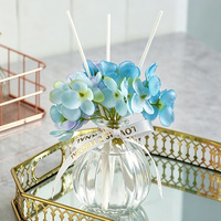 Diffuseur de parfum de luxe en verre en forme de citrouille avec fleur artificielle d'hortensia pour l'aromathérapie, idéal pour les mariages, les fêtes et la décoration intérieure