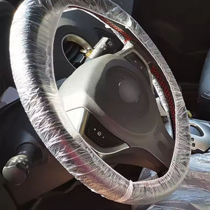 Housse de <span class=keywords><strong>volant</strong></span> <span class=keywords><strong>jetable</strong></span> fabricant personnalisé en gros avec élastique pour la protection du <span class=keywords><strong>volant</strong></span> de voiture - Product Image 2