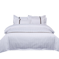 Parure de lit de luxe pour hôtel : Housse de couette et draps en coton 100% à rayures unies ou modernes, design plié