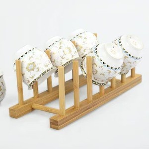 Multifunctional <b>plate</b> storage <b>rack</b> for home kitchens, made of bamboo and wood, for displaying bowls, <b>plates</b>, and dishes. - Product Image 1